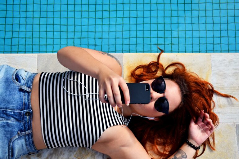 woman relaxing listening to new music